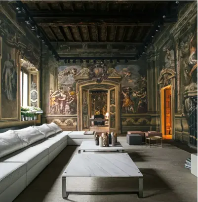  ??  ?? The new BV Tre sofa at the Bottega Veneta Home store, housed within the 18th-century Palazzo Gallarati Scotti that features arched doorways and jawdroppin­g frescoes SUMPTUOUS INTERIORS