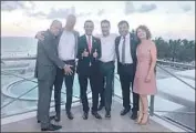  ??  ?? GARCETTI, third from left, poses at a 2017 mayors conference in Miami Beach with his advisor Rick Jacobs, left, who is holding his hand in front of the crotch of an L. A. civic activist. The man said Jacobs did not touch him. His identity is being withheld, and his image obscured, because The Times generally does not identify people who may have been victims of sexual misconduct. The mayor said in a statement that he hadn’t known about the incident in the photo.