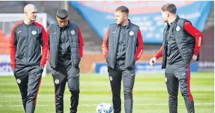  ?? ?? All together now Caolan Boyd-Munce (centre right) with fellow Buddies Alex Gogic, Keanu Baccus and Ryan Strain