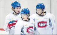  ?? PAUL CHIASSO/ THE CANADIAN PRESS ?? Canadiens, left to right, Ryan White, Brendan Gallagher and Alex Galchenyuk attend training camp Tuesday in Brossard.
