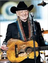  ?? JACQUELYN MARTIN/AP 2014 ?? Willie Nelson, 83, has been performing as recently as Saturday, contrary to reports that he is near death.