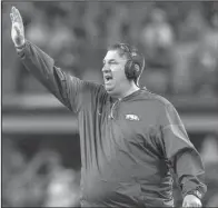  ?? NWA Democrat- Gazette/ JASON IVESTER ?? Arkansas Coach Bret Bielema took part in a number of 11 a. m. games during his tenure at Wisconsin, and he’ll get a chance to experience another one Saturday when the Razorbacks take on Alcorn State at War Memorial Stadium in Little Rock.