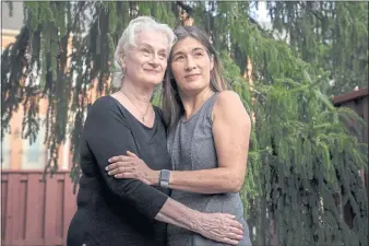  ?? SHURAN HUANG — THE NEW YORK TIMES ?? Marguerita Cheng, right, a financial planner, with her mother, Eileen, in Potomac, Md. Marguerita Cheng helped her mother set up extra defenses for the retirement savings her father left behind.