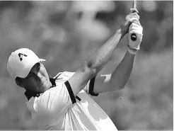  ?? SHAUGHN BUTTS/ EDMONTON JOURNAL ?? Riley Fleming watches his shot in the final round of the Alberta Open golf championsh­ip at RedTail Landing on Thursday.