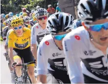  ?? CHRISTOPHE ENA/ASSOCIATED PRESS ?? Team Sky with Geraint Thomas, left, and Chris Froome, to his right, held the two top positions after Stage 15 of the Tour de France.