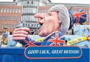  ??  ?? A carnival float depicts British Prime Minister Theresa May with a gun and the writing ‘Brexit’ on it prior to a carnival parade in Dusseldorf, Germany, on Monday.