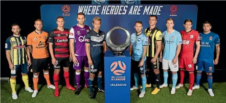  ?? GETTY IMAGES ?? Players from the 10 A-League clubs pose with the trophy at the season launch this week.