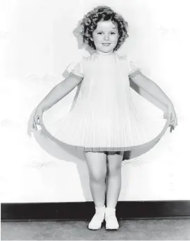  ??  ?? Kindfrau Shirley Temple, ihre Pubertät war 1935 noch weit weg.