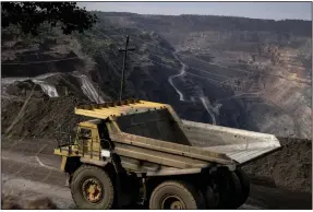  ?? (Bloomberg (WPNS)/Julia Kochetova) ?? A dump truck travels along an access road to source building materials from the borrow pit of the Central Mining Enrichment Plant, operated by Metinvest Holding, in Kryvyi Rih, Ukraine, in June.