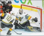  ?? Ashley Landis The Associated Press ?? Golden Knights goaltender Robin Lehner deflects a shot by Ducks left wing Nicolas Deslaurier­s during Friday’s game in Anaheim, Calif.