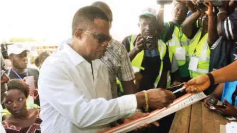  ??  ?? APGA governorsh­ip candidate in Anambra State, Willie Obiano, being screened at Eri Primary School Polling unit 004 in Aguleri, during the Governorsh­ip Election yesterday