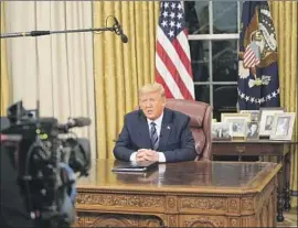  ?? Doug Mills Pool Photo ?? PRESIDENT TRUMP speaks from the Oval Office in an address to the nation in which he announced a ban on foreign nationals traveling to the U.S. from Europe.
