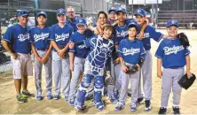  ?? ?? The Dubai Little League Team on an away trip to Kuwait in ■ 2016 with President Roger Duthie (back row).