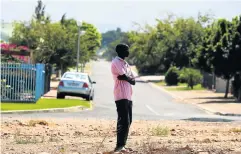  ??  ?? OUTCAST: Johnny Jooste stands in the veld in the suburb of Fairy Glen, Worcester where he and others squat but are despised by residents