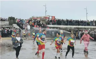  ??  ?? Participan­ts in last year’s Boxing Day Dip in Seaburn.