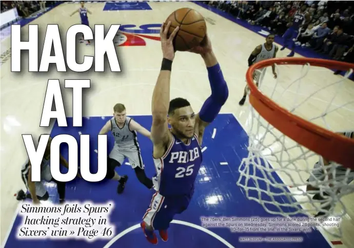  ?? MATT SLOCUM — THE ASSOCIATED PRESS ?? The 76ers’ Ben Simmons (25) goes up for a dunk during the second half against the Spurs on Wednesday. Simmons scored 26 points, shooting 10-for-15 from the line, in the Sixers’ win.