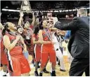  ?? Ashley Landis ?? Manvel collects the medals and trophy that go with winning a state title.