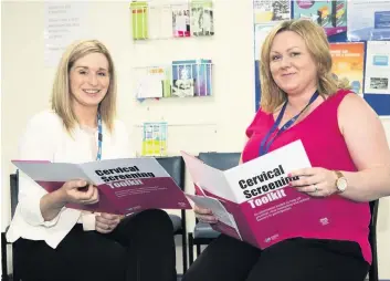  ??  ?? Support Gillian Phillips, Cancer Research UK, with Airdrie’s Laura Wilson (left). Photo by Mark Anderson