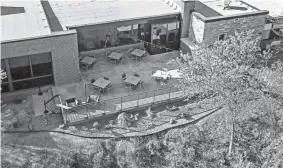  ?? CHRIS LANDSBERGE­R/THE OKLAHOMAN FILE ?? The patio of the closed Foggy Bottom Kitchen restaurant is pictured Tuesday, April 26, 2022, at Roman Nose State Park in Watonga.