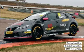  ??  ?? Smiley leapt his Civic to his maiden BTCC race victory