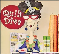  ?? DESIREE ANSTEY/TC MEDIA ?? Inside, Sew Blessed Quilters has an eye-catching tapestry of texture and colour as well as a this charming Quilt Diva character.