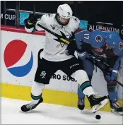  ?? DAVID ZALUBOWSKI — THE ASSOCIATED PRESS ?? Sharks defenseman Nikolai Knyzhov, left, could become a key player on the penalty kill as the season progresses.