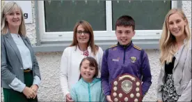  ??  ?? Pupil of the year (Boy) was Paddy Quigley who received the Sean McKenna Perpetual Trophy. From left: Audrey McCarthy (Principal), Eileen Carroll (mum), Kate Wickham (sister), Paddy Quigley and Jane Barrett (Teacher).