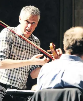  ?? NICK BRANCACCIO ?? Robert Franz of the WSO is leading a workshop for internatio­nal conductors where he advises participan­ts to “get out of the way and listen” to the orchestra.