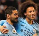  ??  ?? Top Gun: Gundogan hugs Sane