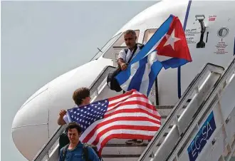  ?? Associated Press ?? Following the loosening of travel restrictio­ns under President Barack Obama, the number of U.S. citizens traveling to Cuba surged by 74 percent from 2015 to 2016.