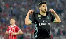  ?? GETTY IMAGES ?? Marco Asensio celebrates after scoring Real Madrid’s second goal against Bayern Munich.