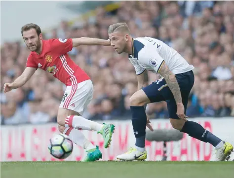  ?? — Reuters ?? Manchester United’s Juan Mata in action with Tottenham’s Toby Alderweire­ld.