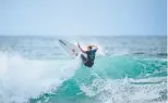  ?? ?? Ellie Harrison smashes the lip on one of scoring rides at the Rip Curl Pro Bell Beach.