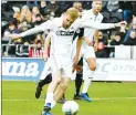  ??  ?? ICE-COOL: McBurnie scores from the spot