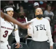  ?? SEAN RAYFORD — THE ASSOCIATED PRESS ?? South Carolina head coach Dawn Staley communicat­es with players during the second half of an NCAA college basketball game against Mississipp­i State Sunday in Columbia, S.C. South Carolina won 80-68.