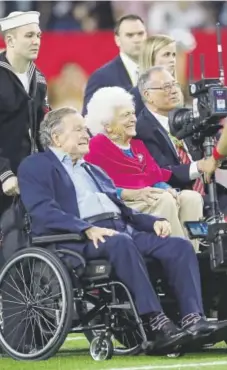  ?? Ronald Martinez, Getty Images file ?? President George H.W. Bush and Barbara Bush watch the coin toss before Super Bowl 51 between the Atlanta Falcons and the New England Patriots at NRG Stadium in February 2017 in Houston.