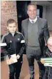  ??  ?? Meeting the boss Kaison’s brother Aiden and cousin Erin with Celtic gaffer Brendan Rodgers