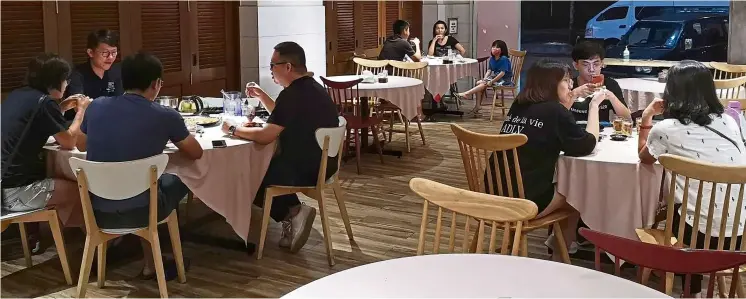  ?? — Photos: CRAB MEET RESTAURANT ?? Because restaurant­s have to comply with putting tables further apart, many are only operating at between 50% to 80% capacity.