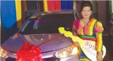  ??  ?? BRAND NEW. Evelyn Fulguerina­s of the Pabahay Realty Services poses beside her brand new Toyota Avanza she won during the raffle. MACO DURIA MENDOZA FACEBOOK PAGE