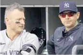  ?? AP ?? Aaron Boone agrees with those who say Josh Donaldson (l.) shouldn’t have said what he did.