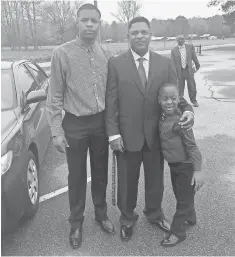  ?? SMITH FAMILY PHOTO ?? Dennis Smith Sr., center, with son Dennis Jr., left, a top prospect, says, unlike Ball, he thinks he’d lose to Michael Jordan.