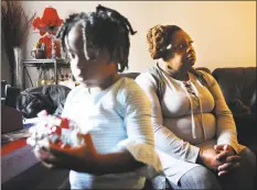  ?? Brian A. Pounds / Hearst Connecticu­t Media ?? Rosetta Melton with granddaugh­ter Alayahrose Melton, 3, in their Bridgeport home.