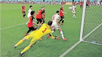  ?? Iol.co.za/sport. | Reuters ?? MOROCCO’S Abdelhamid Sabiri scores their first goal against Belgium in Doha yesterday. Last night, Croatia beat Canada 4-1 with a brace from Andrej Kramaric to top Group F. For the latest on yesterday’s late game between Spain and Germany, go to