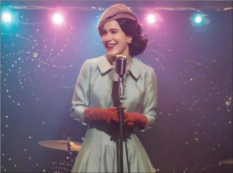  ?? AMAZON ?? Rachel Brosnahan is back behind the mic as housewife-turned-comic Midge Maisel in the second season of Amazon Prime’s “The Marvelous Mrs. Maisel.”