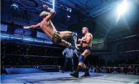  ??  ?? Adam Brooks aims a flying kick at Slex at the Thornbury Theatre in Melbourne. Photograph:Owen Jones/Digital Beard Photograph­y