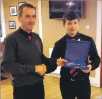  ??  ?? The Under 14 Player of he Year was Ross Campbell who was presented with his award by Steven Sloss.