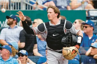  ?? COLIN E. BRALEY/AP ?? Orioles catcher Adley Rutschman had planned to play football all four years at Oregon State until the realizatio­n settled in midway through the baseball season that maintainin­g that lifestyle wasn’t only strenuous, it was taking away from his developmen­t on the diamond.