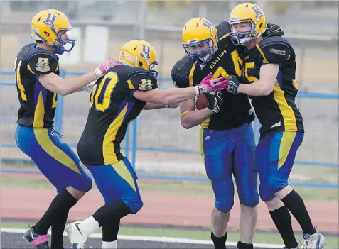  ?? GREG PENDER/THE Starphoeni­x ?? Adam Morrison of the Saskatoon Hilltops, second from right, is expected to receive more playing time as the team defends its championsh­ip title.