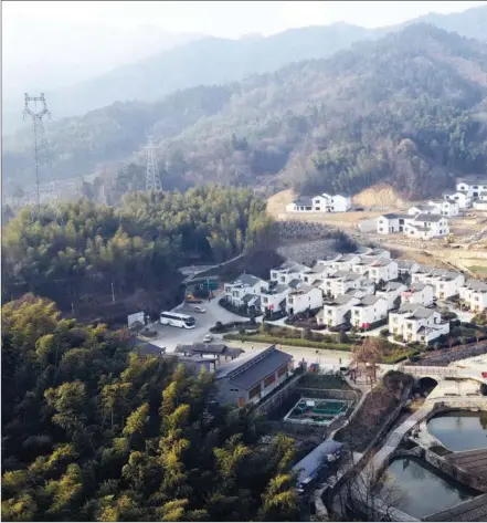  ?? CHEN NUO / XINHUA ?? A bird’s-eye view of Dawan village, Jinzhai county, taken last month.