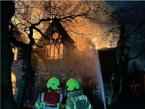  ?? (PA) ?? Firefighte­rs tackle a blaze at St Mark’s Church in the early hours of yesterday